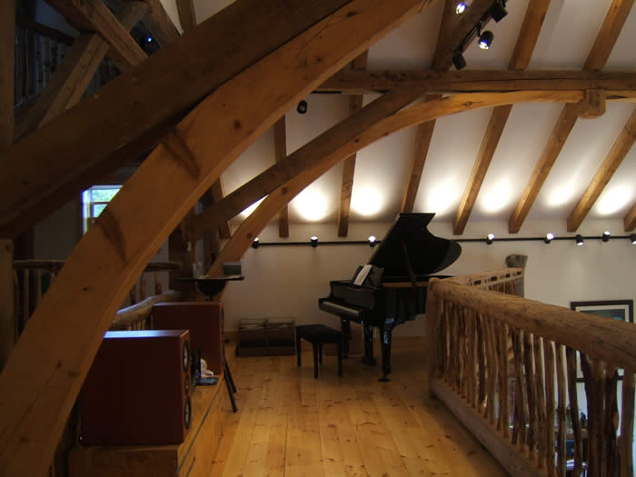 Curved Timber Frame Arches in the Loft
