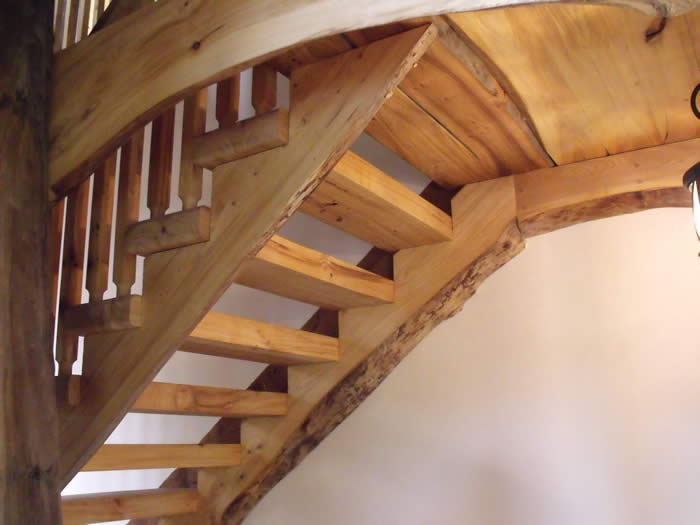 The elm stairs in the Heritage timber frame