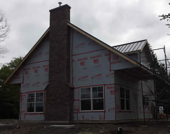 The outside of the Spruce Timber Frame during construction