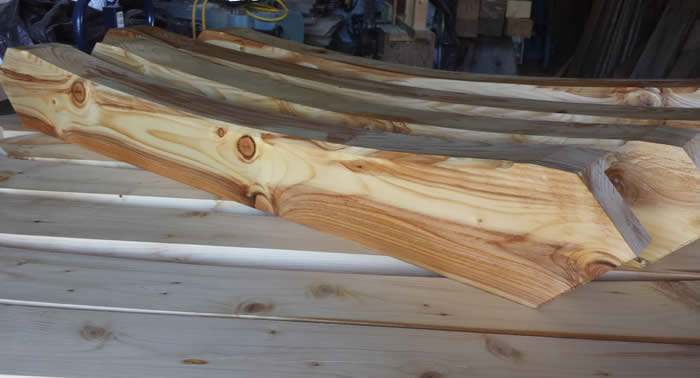 Timber Frame Braces Oiled in the shop