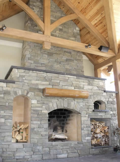 Outdoor kitchen log mantle