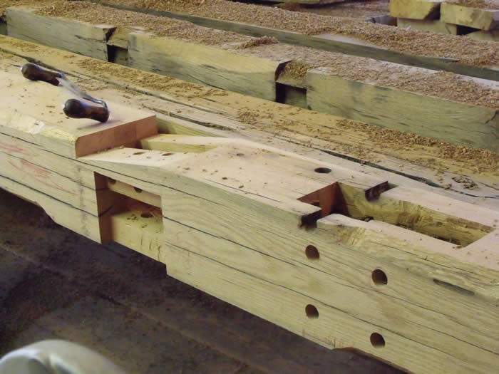 Post with beam and brace mortises