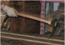 hand-hewing the finish with an adz